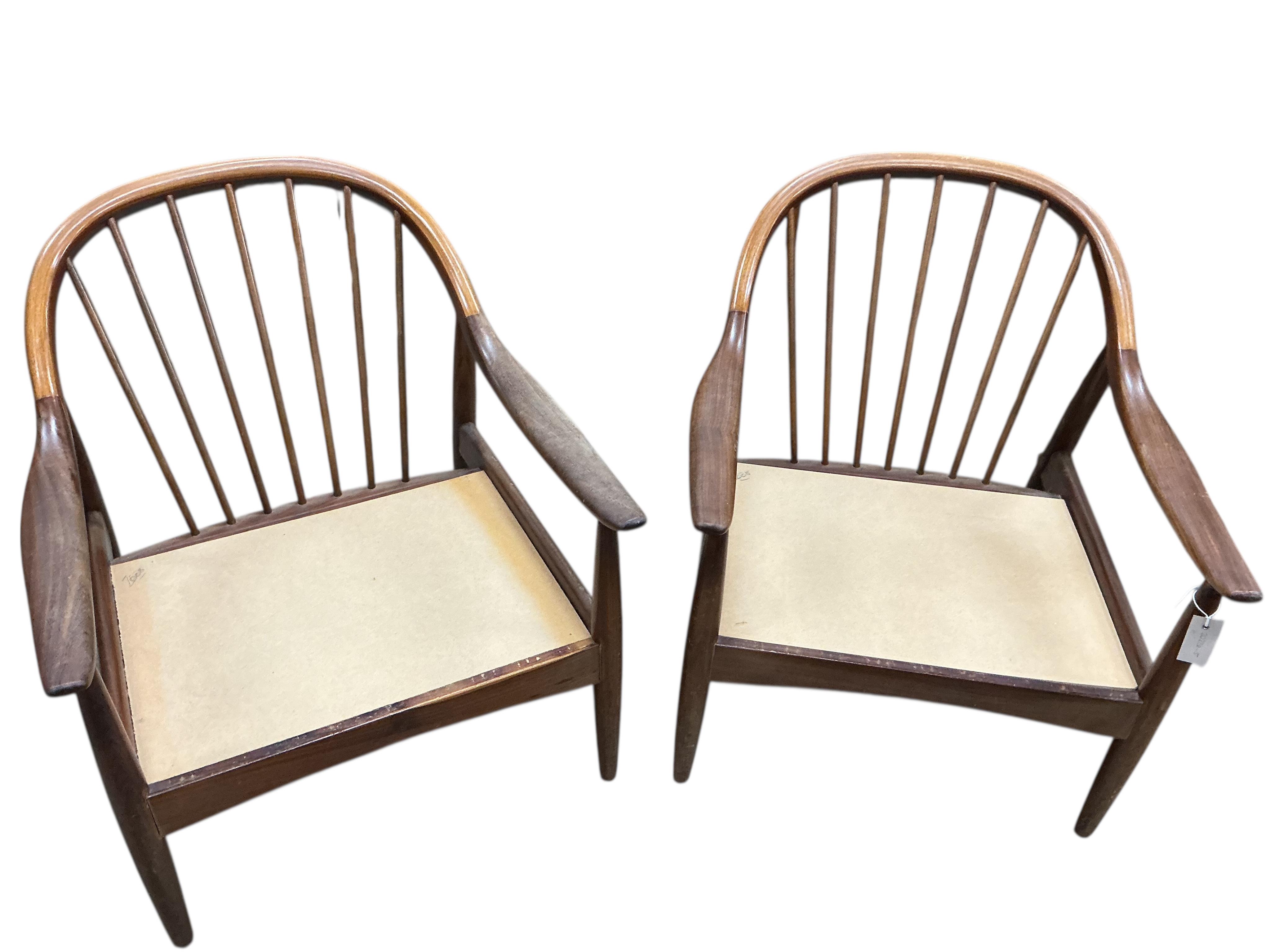 Greaves and Thomas: A pair of mid century teak armchairs, width 62cm, depth 70cm, height 70cm